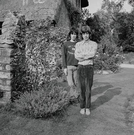 Young Mick Jagger and Keith Richards standing together outdoors
