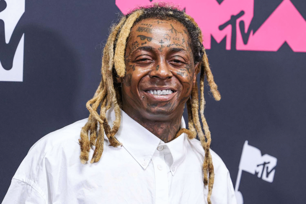 Lil Wayne smiling in press photo