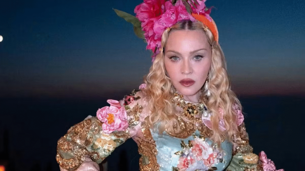 Madonna wearing a floral dress and headpiece for her 68th birthday in Greece